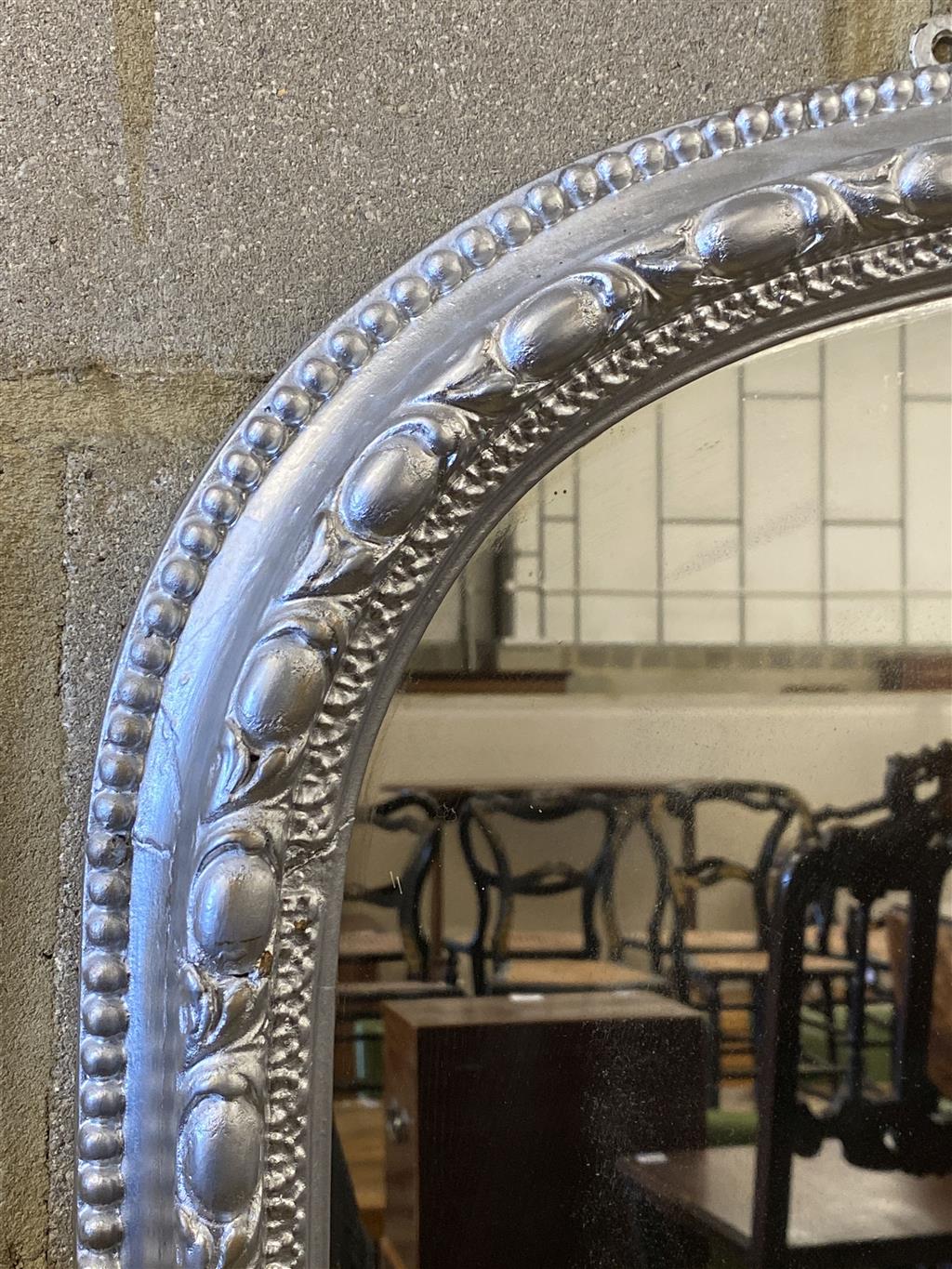 A Victorian, later silvered carved wood framed overmantel mirror, width 92cm, height 195cm